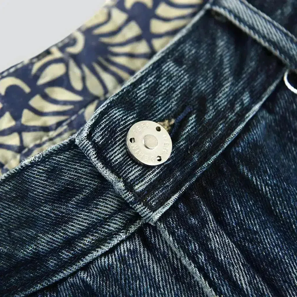 Medium-wash men's mid-waist jeans